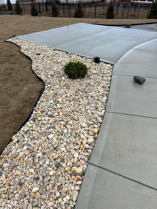 River rock strip along a new driveway